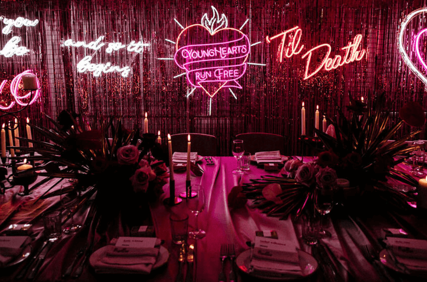 How do you hang a neon sign wedding backdrop?