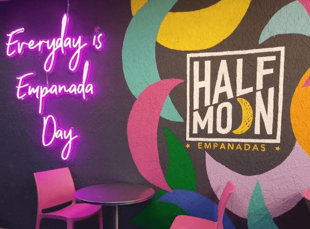 Half Moon Empanadas: Adding a Touch of Nostalgia with Neon Signs