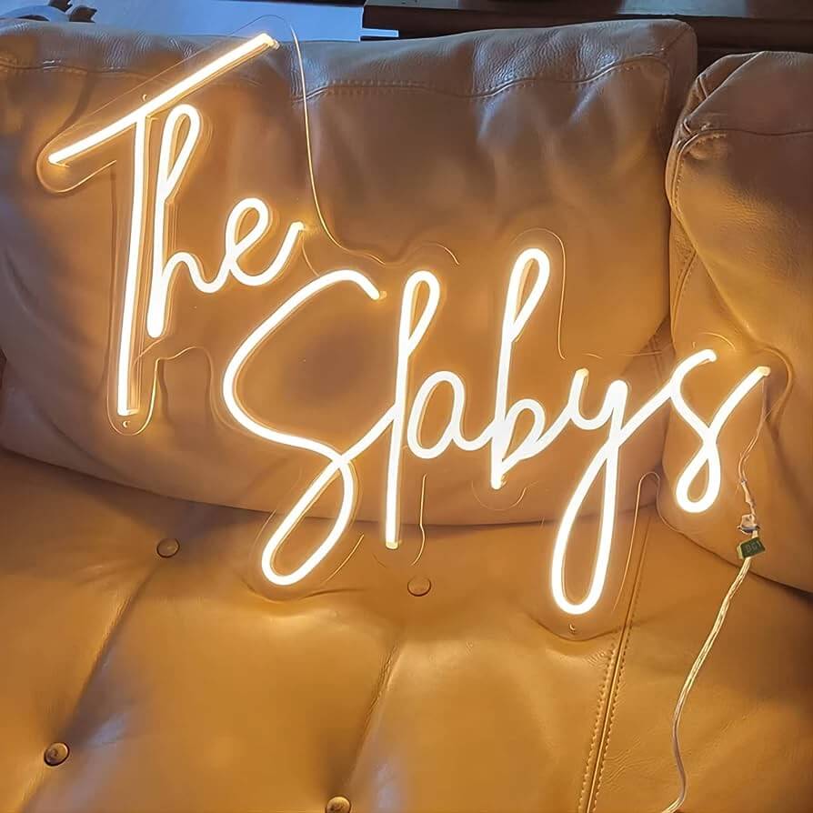 neon sign for gifts the slabys yellow
