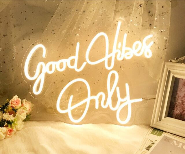 neon sign for good vibes only yellow